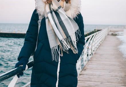 Woman wearing fur trim coat