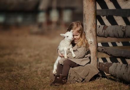 Child with a lamb
