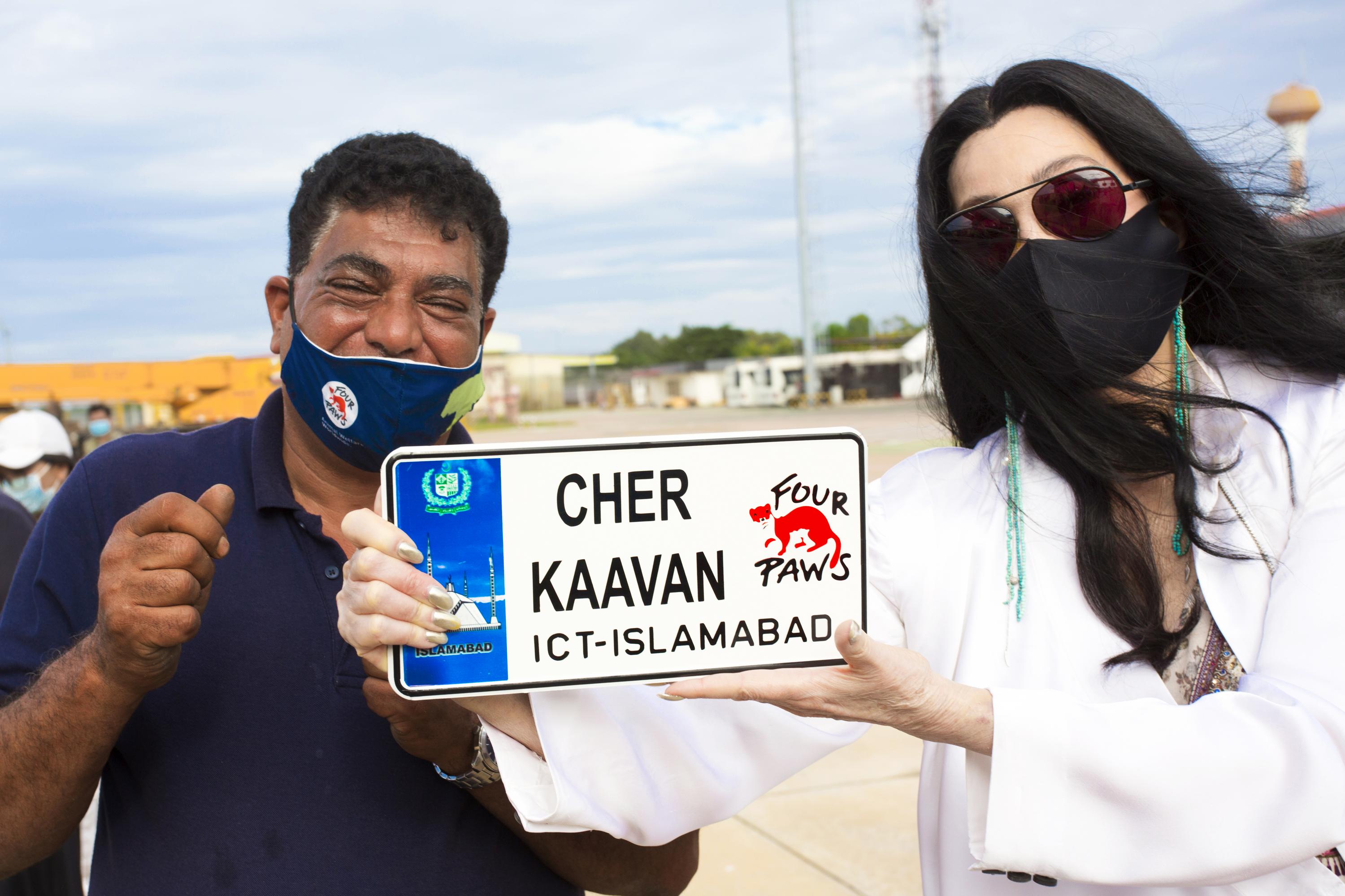 Pop star Cher and Dr. Amir Khalil at Siem Reap Airport, Cambodia